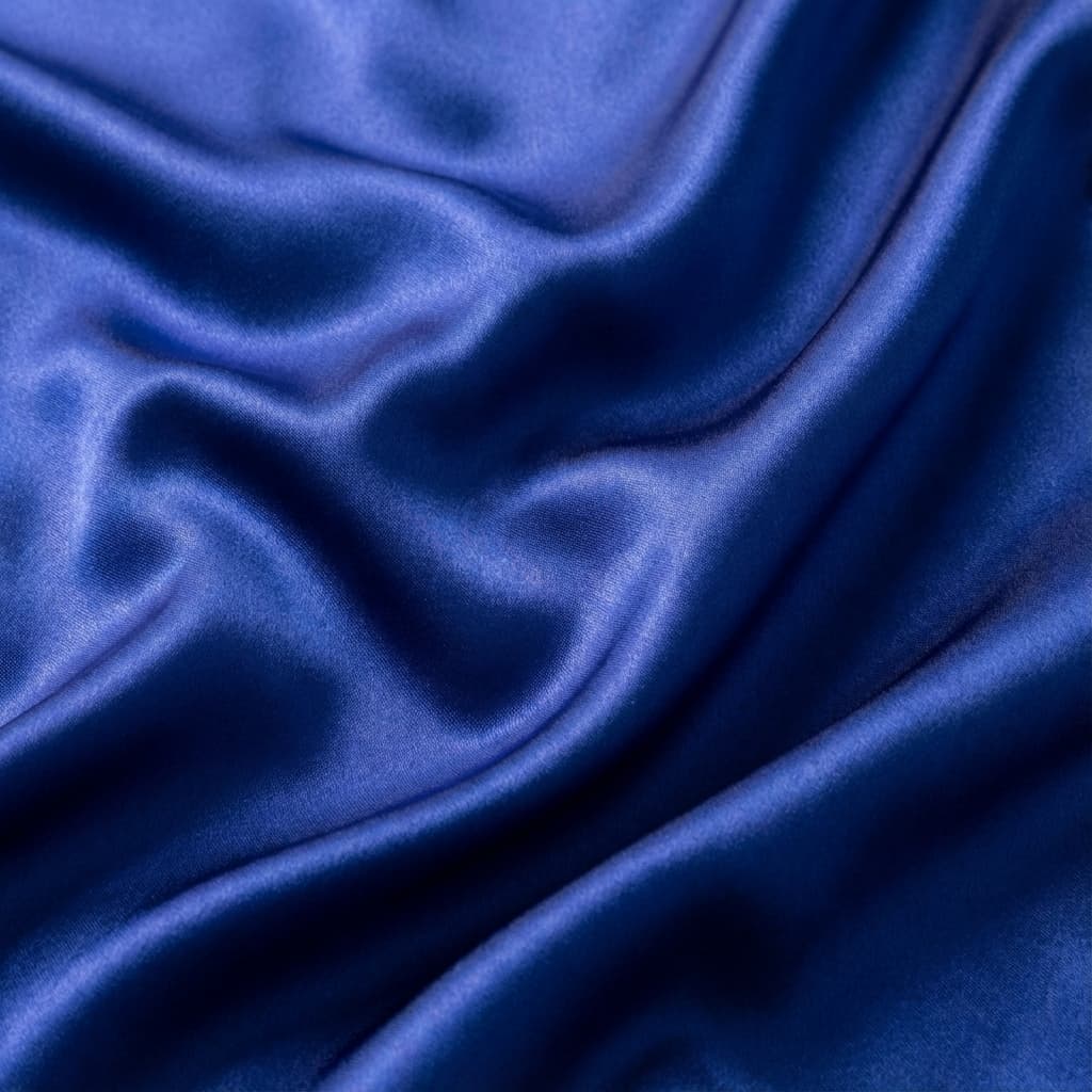 A lustrous, dyed silk fabric shimmering. - Silk Fabric Dyeing by Shoeb Dyeing Service(Fabric Dyer)